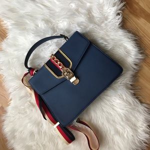 Elegant bag of red blue and gold
